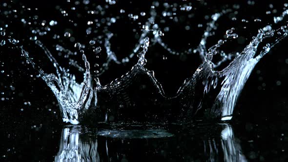 Super Slow Motion Shot of Water Crown Splash at 1000Fps Isolated on Black Background alt