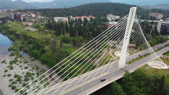 Aerial drone view of cable stayed Millennium bridge, Podgorica, Montenegro