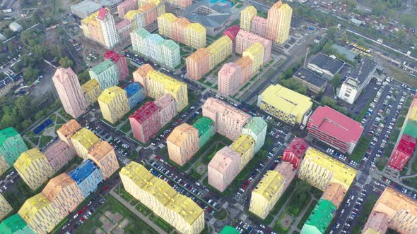 Top view of the colorful modern buildings, aerial footage from the drone alt