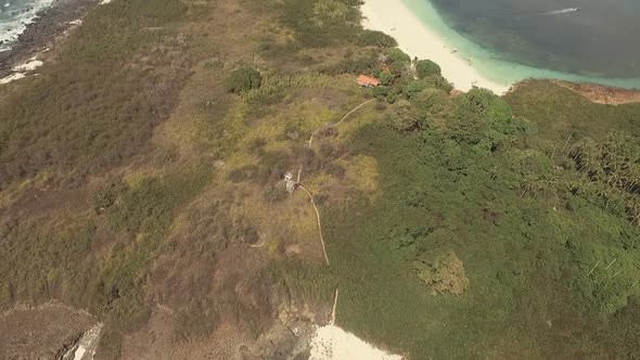 Aerial Tilt Reveal shot of Iguana Island, Republic of Panama alt