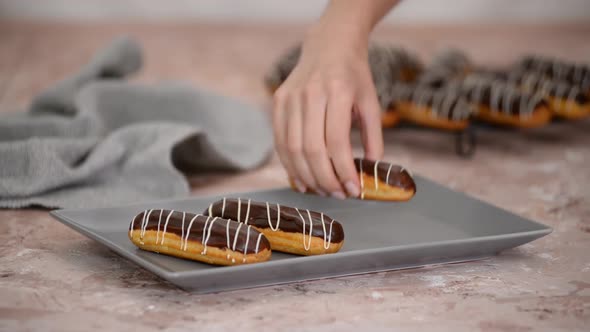 French dessert eclair with chocolate and custard. Traditional French dessert.