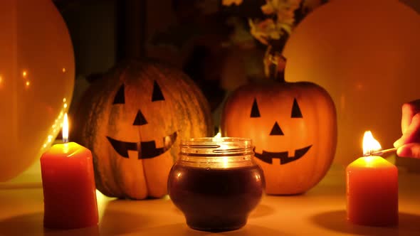 Halloween Pumpkin Decoration Female Hand Lights Candles in Dark Night alt
