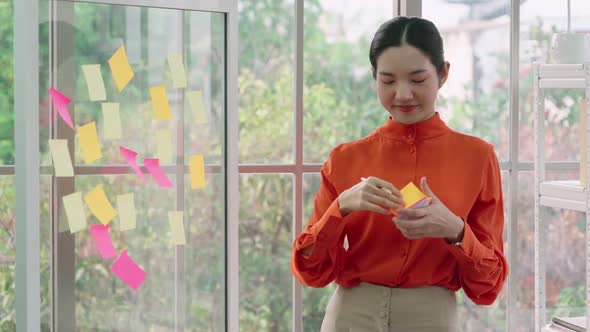 Business People Work on Project Planning Board alt