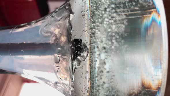 Closeup Slow Motion Abstract Video of Bubbles From a Tube in a Glass Vessel with Water a Hookah alt