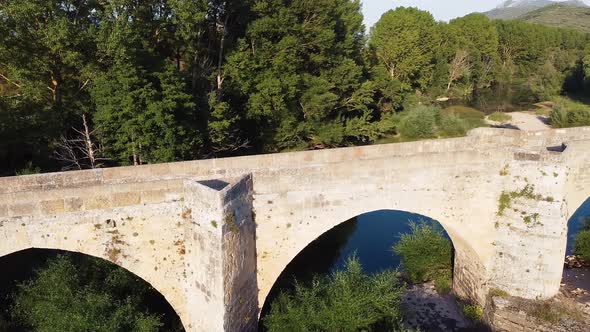 Aerial View of a Medieval Stone Bridge Over Ebro River in Frias, Historic Village in the Province of alt