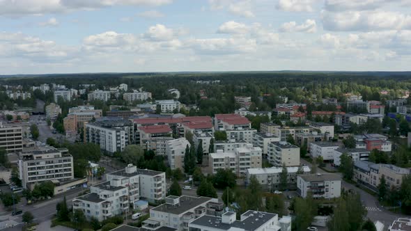 Slow aerial view high above buildings near Helsinki, Finland. alt