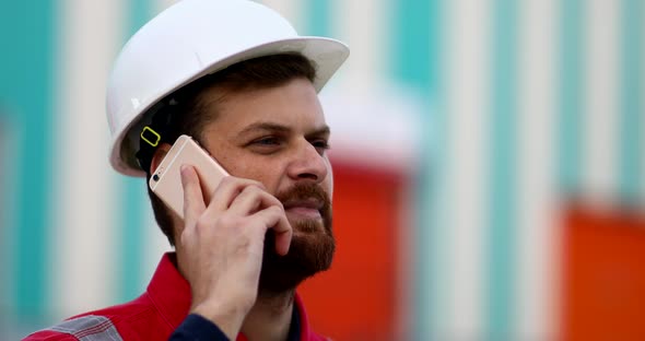 Construction Worker Using Mobile Phone alt