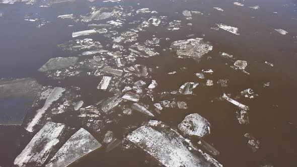 The Ice Floes Floating on the River. The Ice Drift in Spring Time