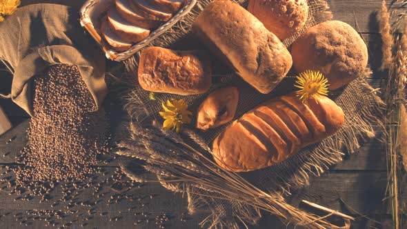 Still life with Bread, Wheat, Flour and Flowers.
