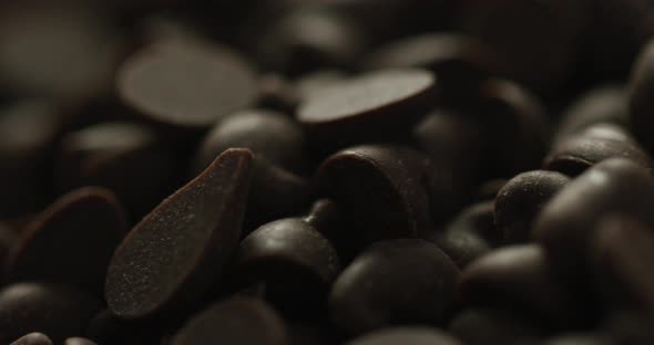 Video of close up of multiple chocolate chip background alt