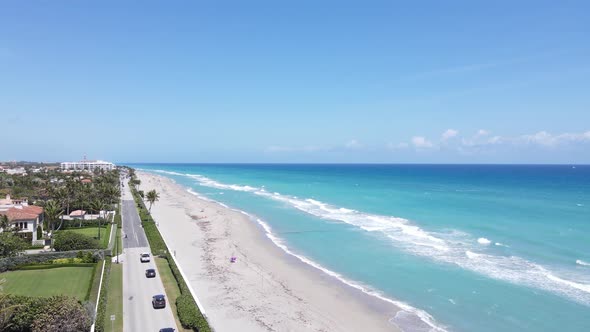 Gorgeous coastal turquoise water beach of West Palm Beach, Florida by drone alt
