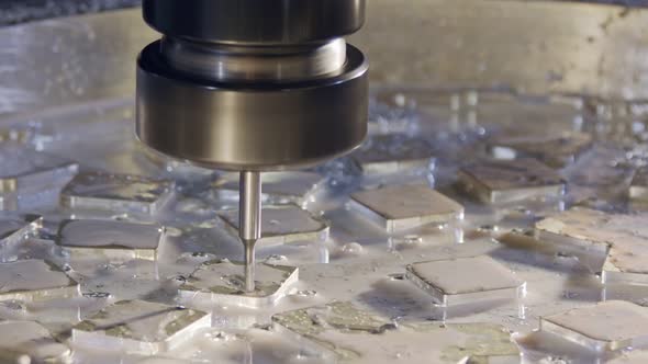 Machining process - high precision CNC mill manufacturing an advanced metal part