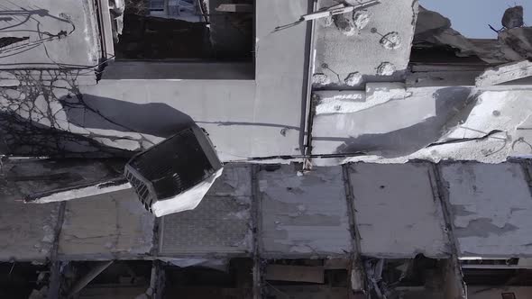 Vertical Video of a Multistorey Building Destroyed During the War in Ukraine alt