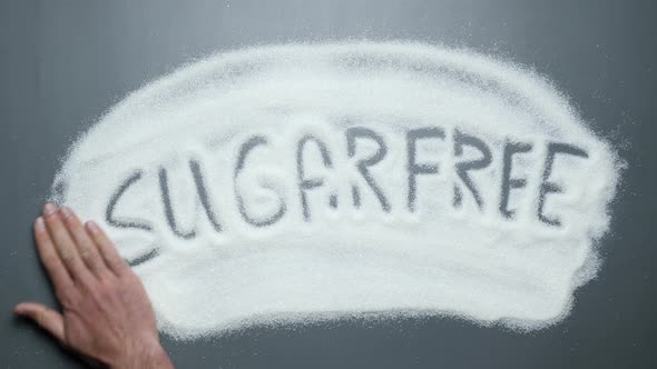 Sugarfree word handwriting revealing. Stop diabetes. Obesity, cardiovascular diseases. alt