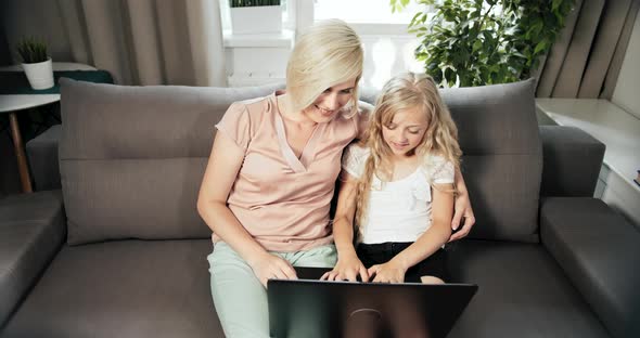 Mother and Daughter with Laptop