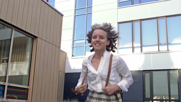 Schoolgirl is Late for School alt