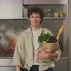 Portrait of Man Holding Grocery Bag on Modern Kitchen - VideoHive Item for Sale