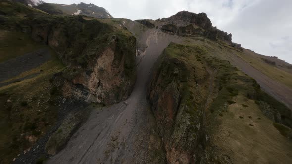 FPV Drone Shot Flying Through Stone Gates