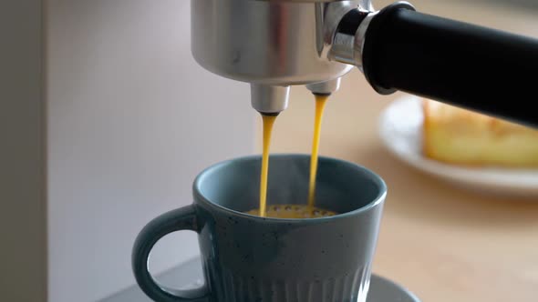 Morning Ritual at Breakfast with Pouring Coffee From Coffee Machine Making Espresso