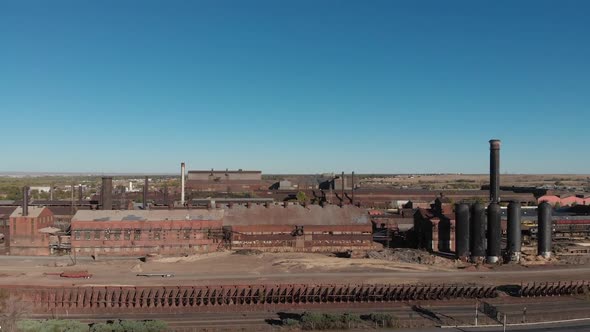 Aerial of antique steel processing factory in Pueblo Colorado.  Antique U.S. industrial might. alt