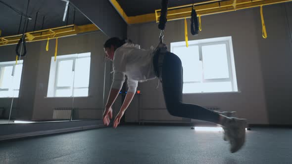 Modern System of Fitness for Good Body Shape and Physical Condition Exercises with Suspension System alt