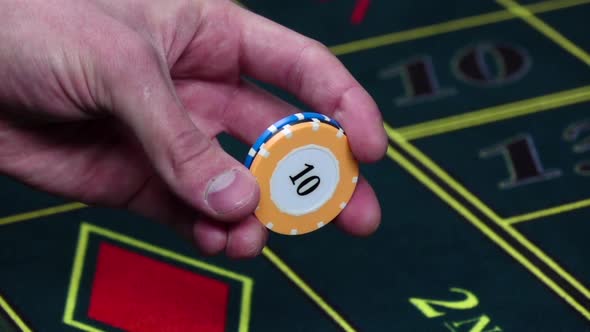 Croupier Makes a Trick with Standart Poker Chips, Slow Motion alt