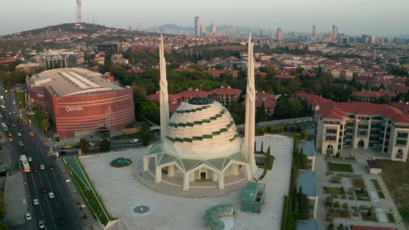 Futuristic Mosque in Istanbul, Modern Looking Temple at Sunset with Cityscape, Aerial Forward alt