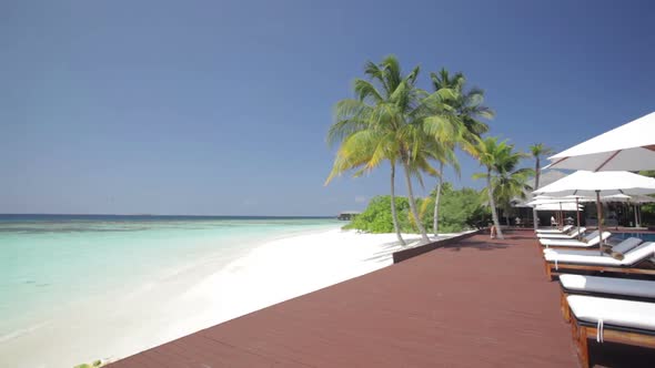 Beach Pool Scenery With Sunloungers alt
