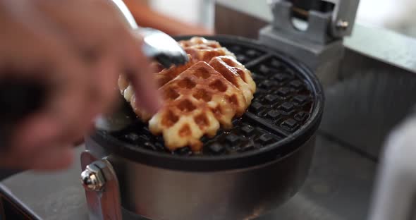 Making croissants for breakfast by baking them on the stove and then placing them on a white plate i alt