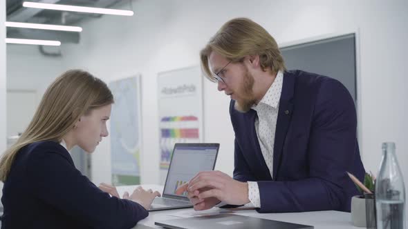 Successful Independent Confident Boss in a Business Suit Flirting with a Subordinate or Secretary alt