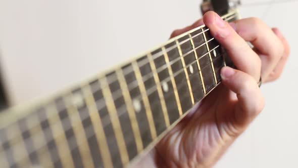 Man Playing An Acoustic Guitar alt
