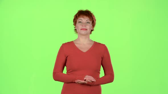 Woman in the Theater Claps Bravely To the Actors. Green Screen alt