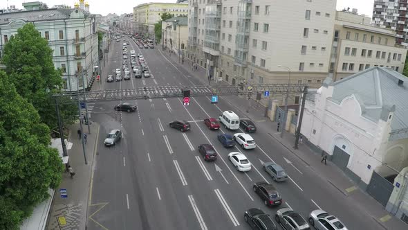 Aerial view of city motorway with car traffic alt