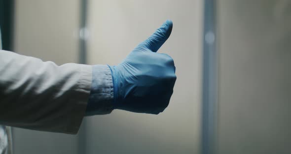 the Doctor's Hand Shows a Thumbs Up