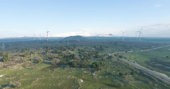 Aerial view of wind turbine farm in a grassland, Golan Heights, Israel. alt