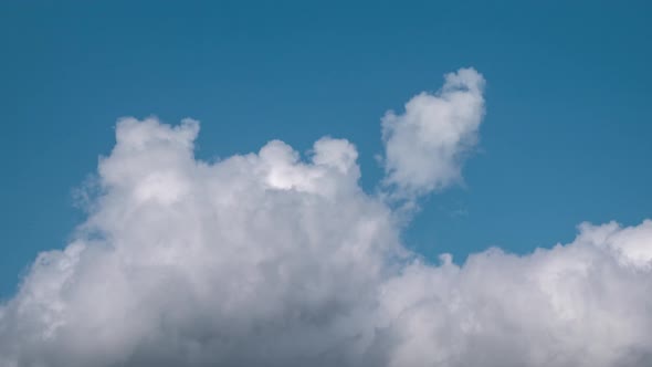 Clouds Flying in Blue Sky, Timelapse. alt