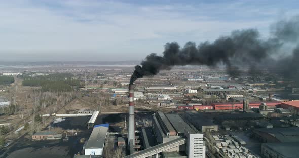 Coal-Fired Smokestack Releasing Black Smoke Into the Air
