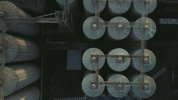 Aerial View of a Drone Flying Over the Beer Production Plant Several Rows of Tanks