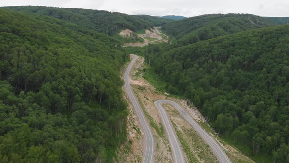 Aerial  Drone Video of Top Vew of Winding Road in the Mountains