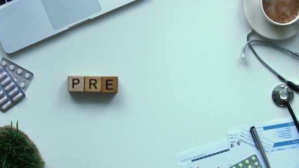 Prevention Word Made of Wooden Cubes Stop Motion, Vaccination Awareness Top View alt