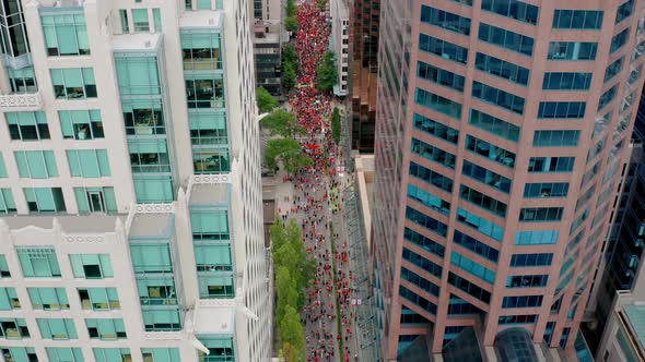 Native Activists March in Downtown Vancouver on Canada Day, Cinematic Drone Reveal of the Moving Cro alt