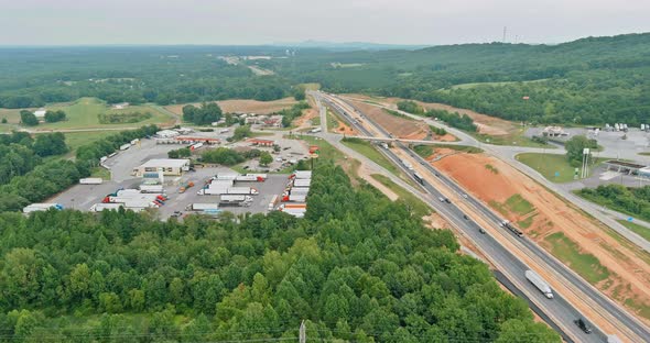 Aerial view with heavy machinery joining the reconstruction of 85 highway alt