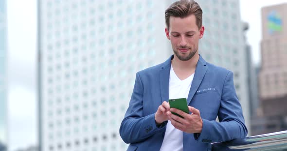 Caucasian businessman use of cellphone alt