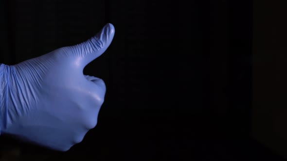 A Doctor In Blue Gloves Shows That Everything Is Fine