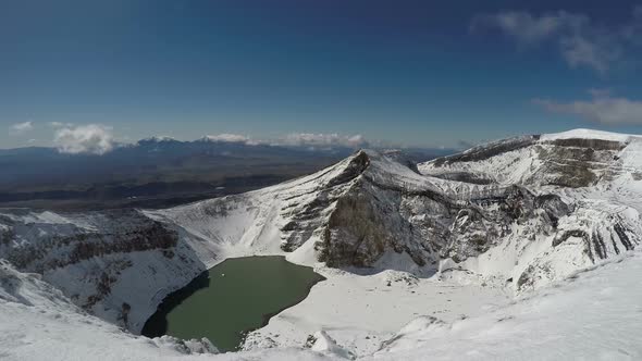 Snowbound Craters and a Crater Lake of Active Gorely Volcano on Kamchatka Peninsula