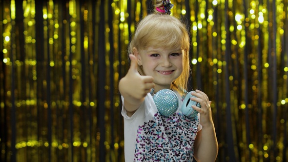 Child Dances, Listens Music on Headphones. Little Kid Girl Dancing, Having Hun, Relaxing, Enjoying alt