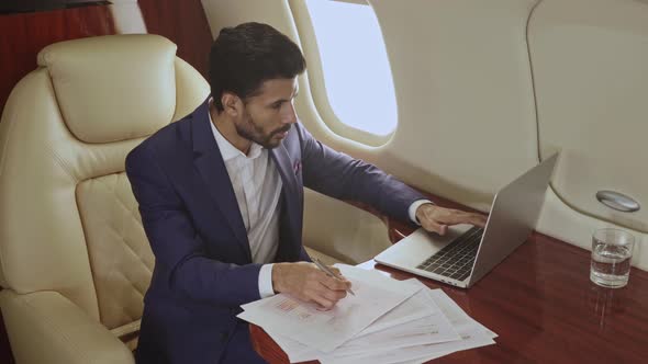 Businessman working with paper documents.