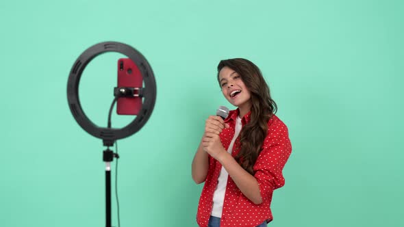 Happy Kid Singer Use Modern Technology for Vlogging Online Performing alt