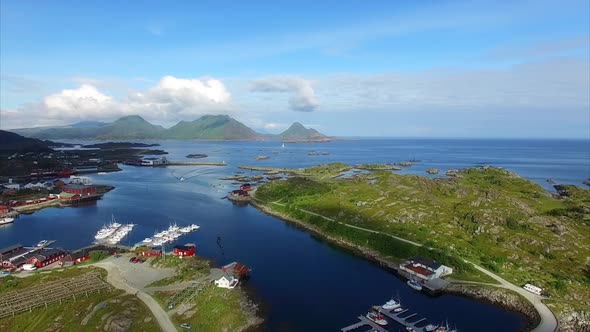 Flying above port of Ballstad on Lofoten islands alt