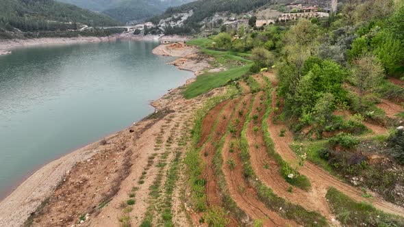 Farming on the banks of the river aerial view Alanya Turkey 4 K alt